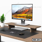 Wooden monitor stand MS-201 on desk with computer, keyboard, mouse, and potted plant