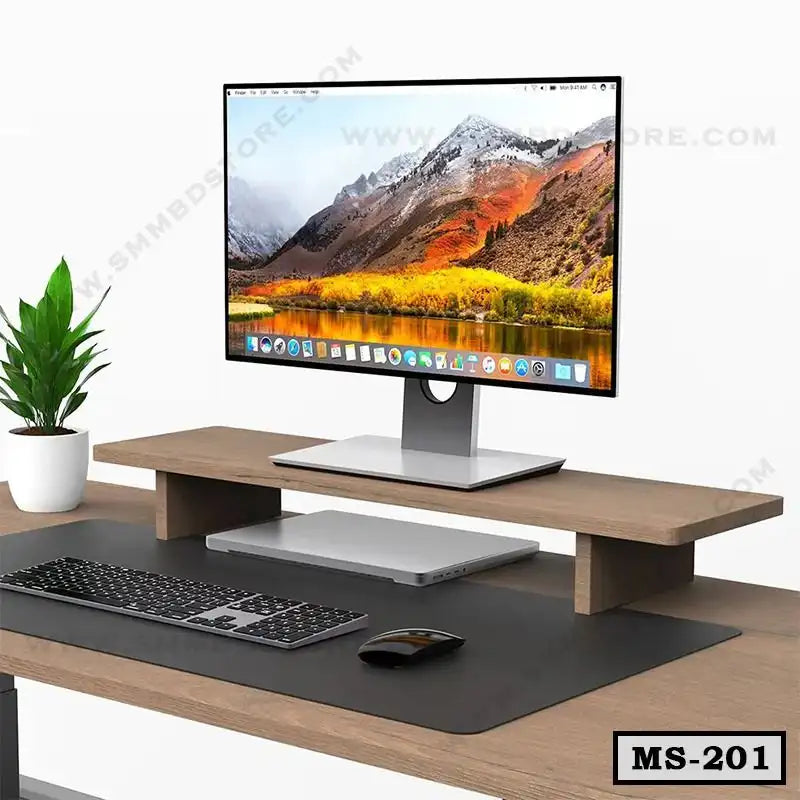 Wooden monitor stand MS-201 on desk with computer, keyboard, mouse, and potted plant