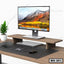Wooden monitor stand MS-201 on desk with computer, keyboard, mouse, and potted plant