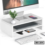 White monitor stand with storage shelf, holding desktop accessories and electronics