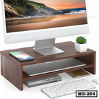 Wooden monitor stand holding desktop screen, phone, plant, and keyboard organizer