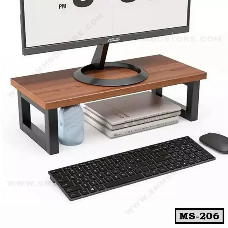 Wood and metal monitor stand with storage space for books, ideal for office desktop setup.