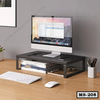 Modern black monitor stand on desk with computer, books, and keyboard in home office setup