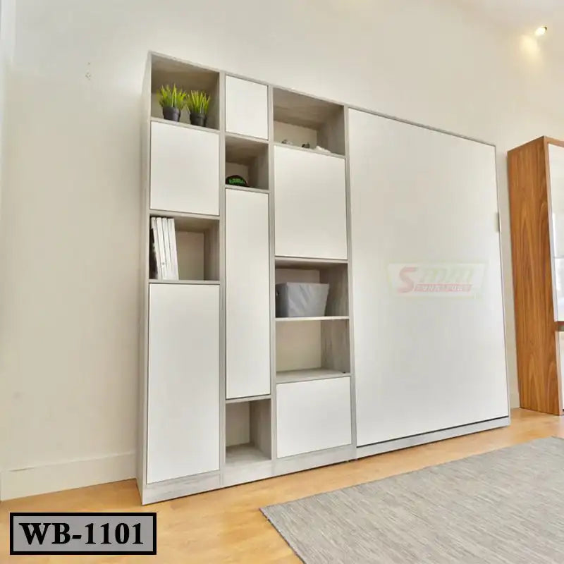 Modern white Murphy wall bed with shelving units in a bright room with wood floor