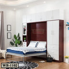 Modern Murphy wall bed with white storage cabinets, integrated shelving, and a cozy bedroom setting