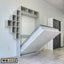 Modern wall bed with shelving unit in minimal bedroom, partially unfolded for space saving.