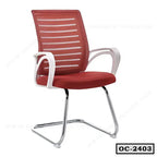 Modern red mesh office chair with white armrests and chrome cantilever base