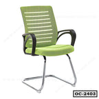 Modern green office chair with mesh back, armrests, and chrome sled base