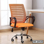 Orange ergonomic office chair with mesh back and wheels next to a modern white desk