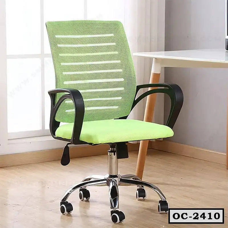 Modern green mesh ergonomic office chair with wheels and armrests in a home workspace