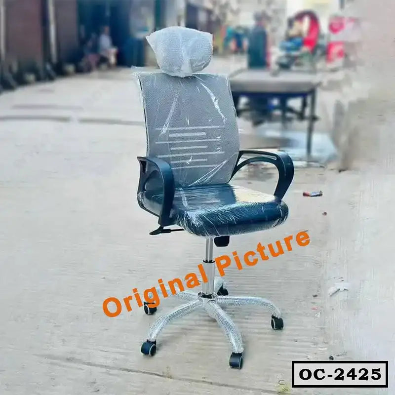 Ergonomic mesh office chair with headrest and armrests, wrapped in plastic, outdoor setting