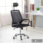 Ergonomic black mesh office chair with headrest and armrests in a modern home office setting