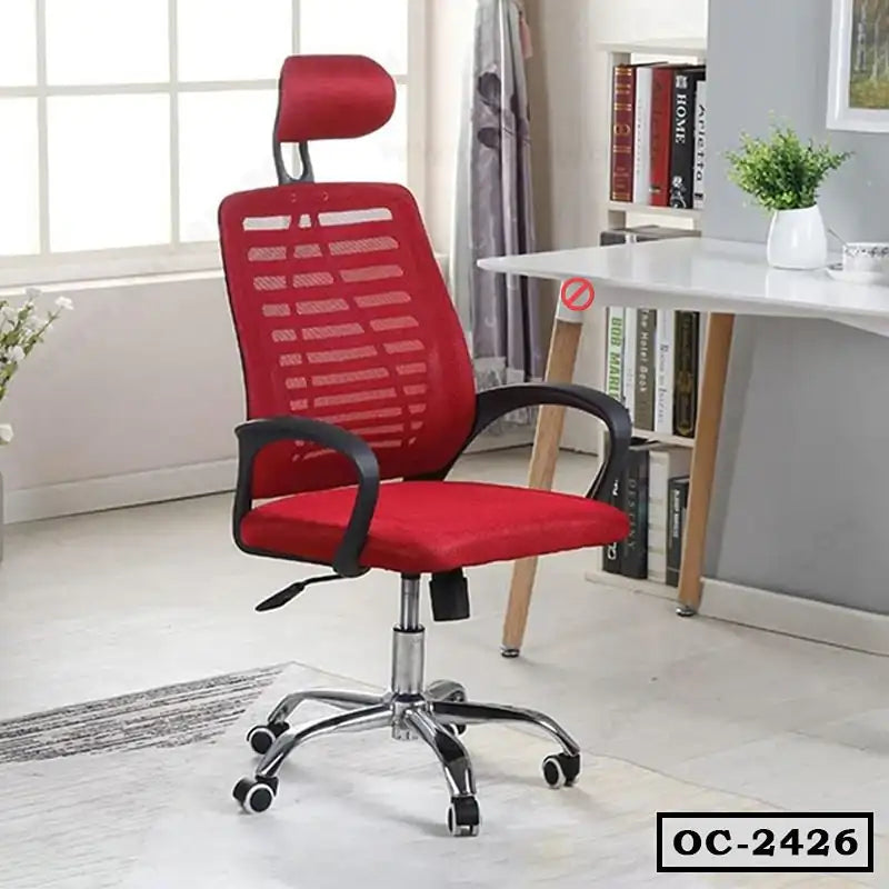 Red ergonomic mesh office chair with headrest and armrests in a modern home office