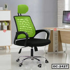 Green mesh ergonomic office chair with headrest and wheels in a modern workspace