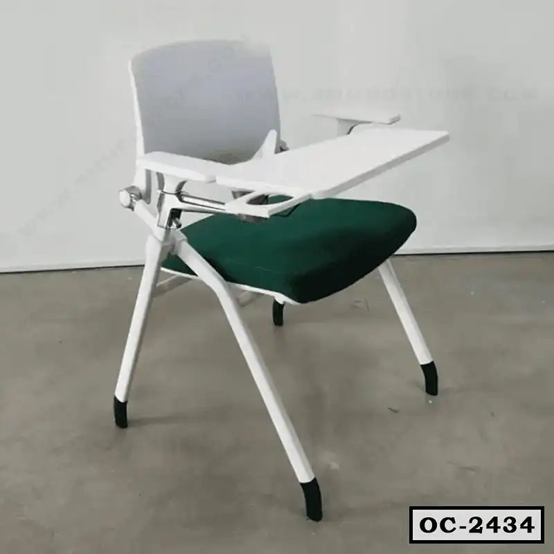 Modern office chair with white frame, green cushioned seat, and attached foldable writing desk