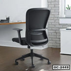 Modern ergonomic black office chair with mesh backrest on wheels in a home office setting