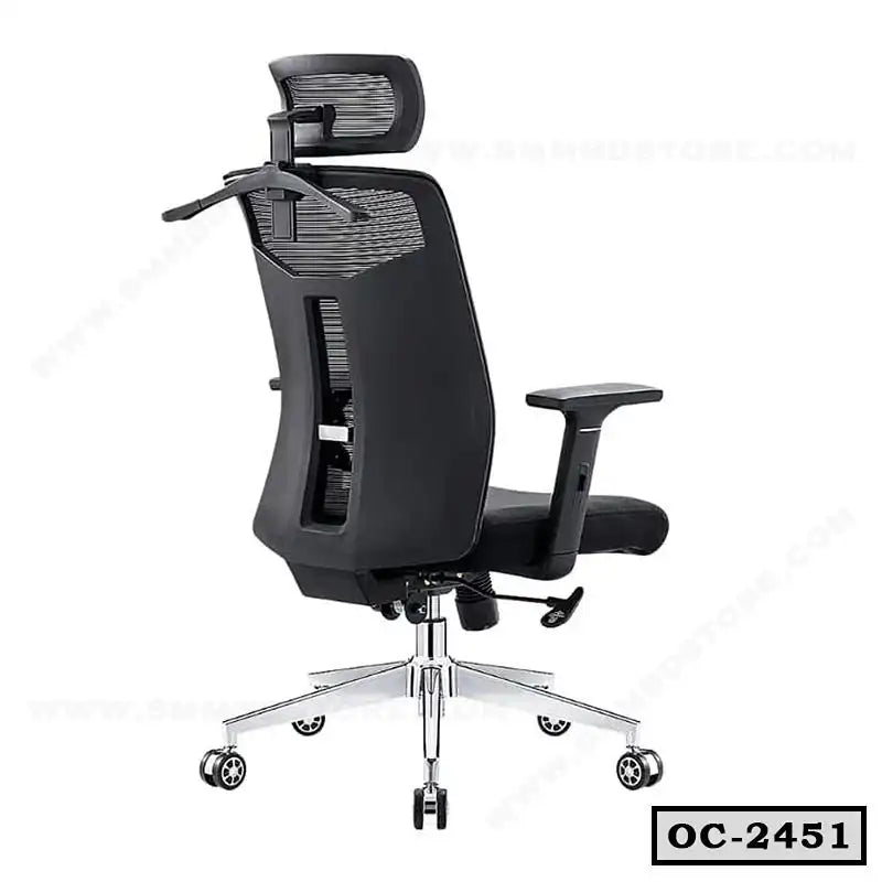 Ergonomic black office chair with adjustable headrest, mesh back, armrests, and wheels