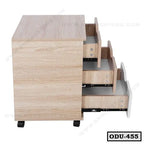 Wooden office drawer unit with three open drawers and wheels, modern storage furniture