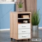 Wooden office drawer unit with three white drawers, open shelf, and caster wheels