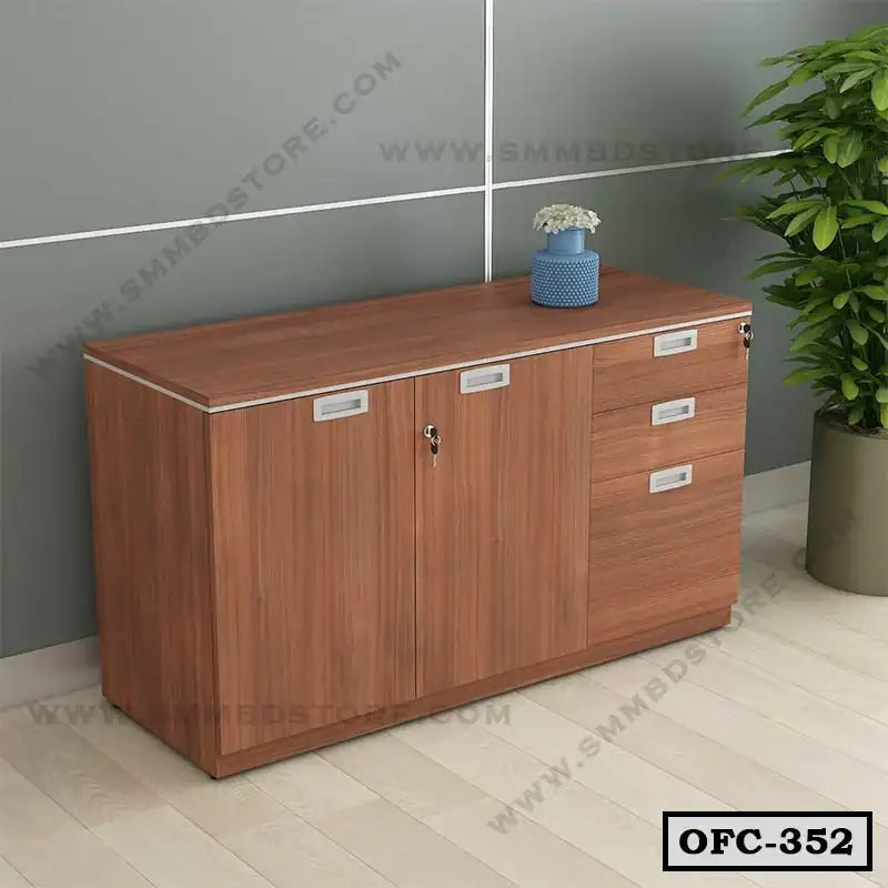 Modern wooden office file cabinet with drawers and doors, placed in a workspace setting. Main image