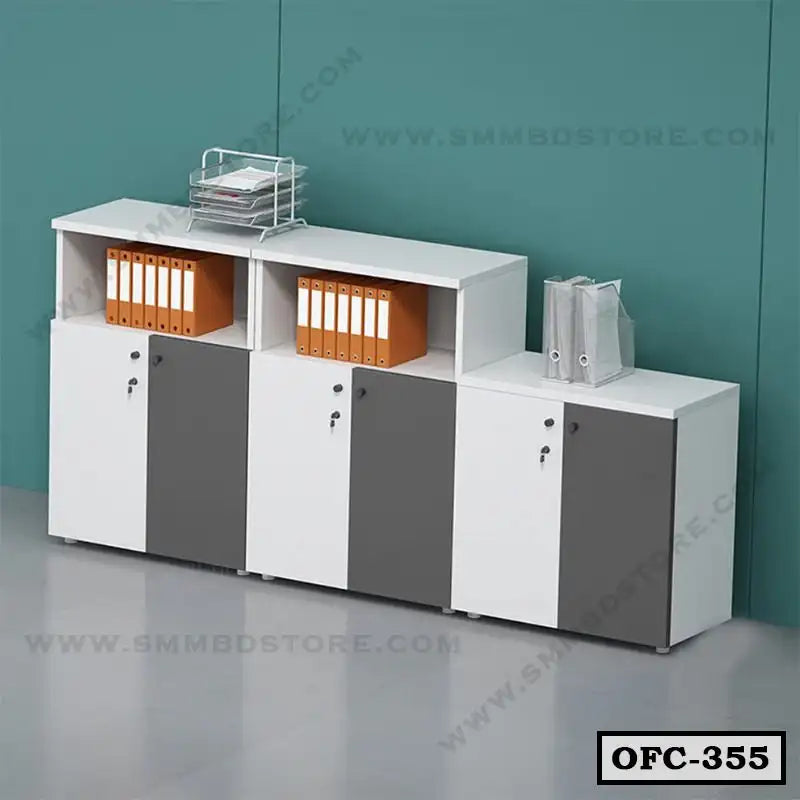 Modern office file cabinet with lockable doors and open shelves storing folders, against a teal wall.