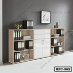 Modern wooden office file cabinet with open shelves, binders, and white drawers against a gray wall.