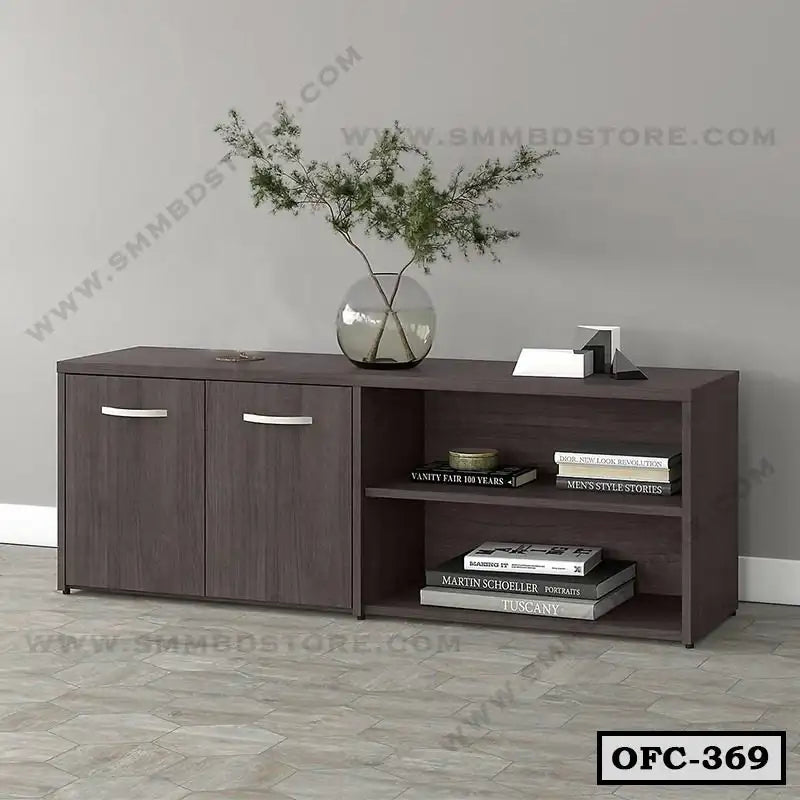 Modern wooden office file cabinet with shelves, decorative vase, and books against gray wall