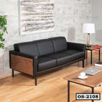 Modern black leather office sofa with wooden sides in a stylish office setting