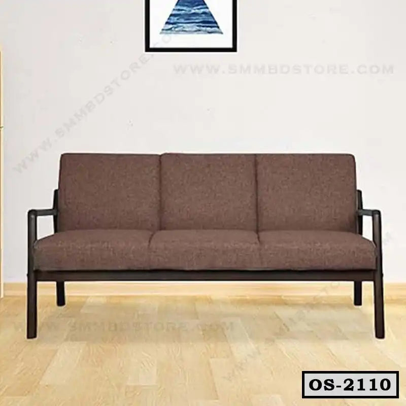 Modern brown office sofa with black metal frame on wooden floor in minimalist room