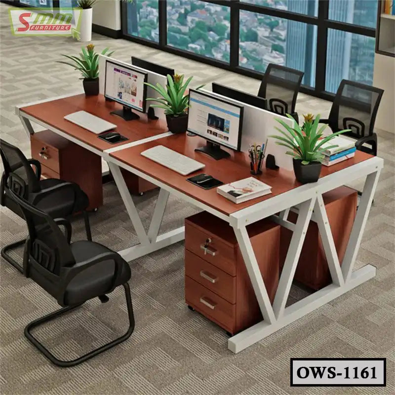 Modern office workstation desk with computers, chairs, plants, and storage drawers Main image