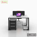 Modern office workstation with drawers, partition, and rolling shelves, featuring a laptop.