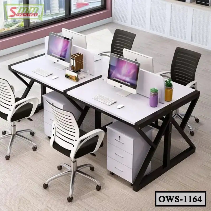 Modern office workstation with four chairs, white desks, computers, and drawer units
