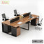 Modern office workstation desk with four ergonomic chairs and partition panels