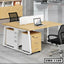 Modern office workstation desk with storage, divider, and black mesh chair in workspace