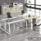 Modern office workstation set with glass desk, ergonomic chairs, storage cabinets, and natural light