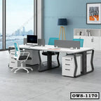 Modern office workstation desk with partitions, ergonomic chairs, and storage drawers in spacious workspace