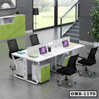 Modern office workstation with four black mesh chairs, white desk, and green storage cabinets