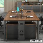 Modern office workstation desk setup with chairs, laptops, and storage cabinets