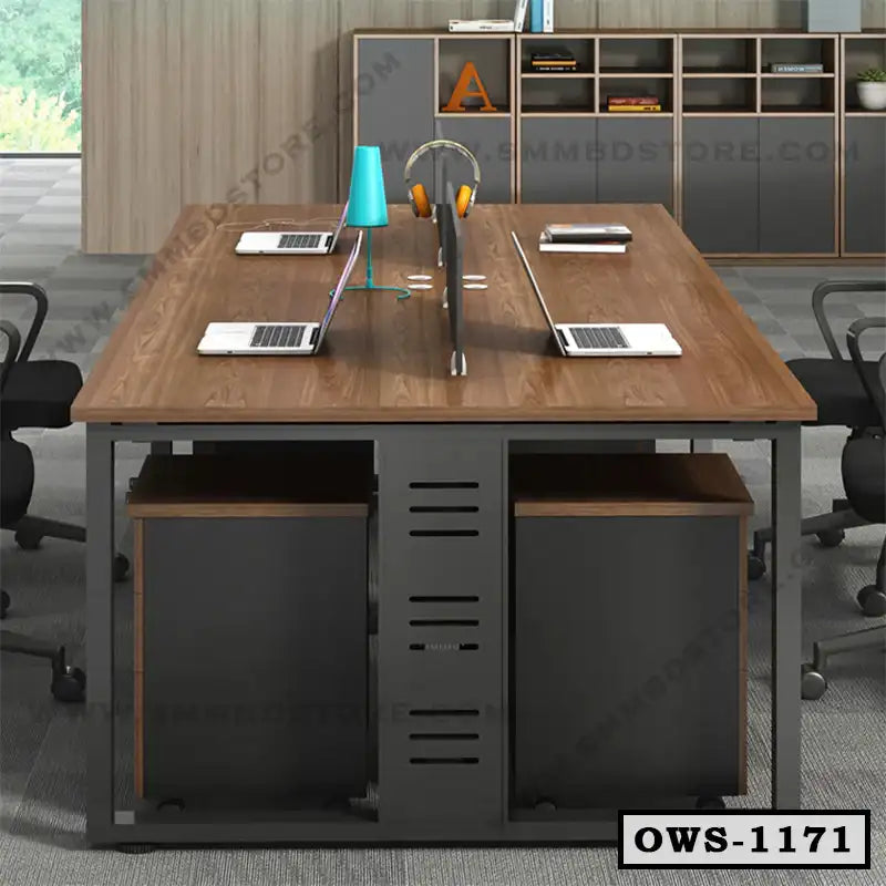 Modern office workstation desk setup with chairs, laptops, and storage cabinets