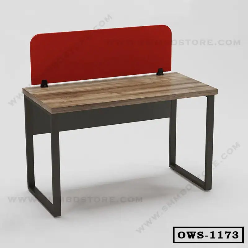 Modern office workstation desk with wood finish, red privacy panel, and metal frame.