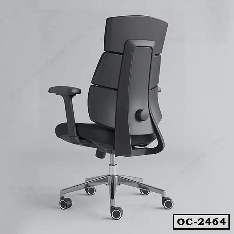 Ergonomic black office chair with adjustable armrests and high back on caster wheels