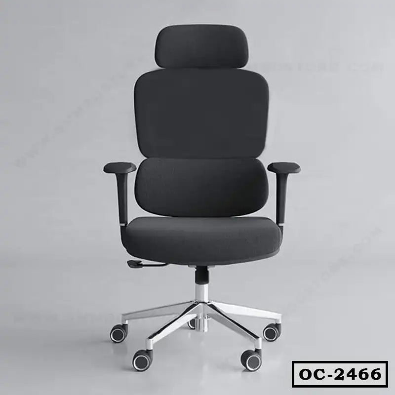 Ergonomic black office chair with headrest, armrests, and wheeled metal base