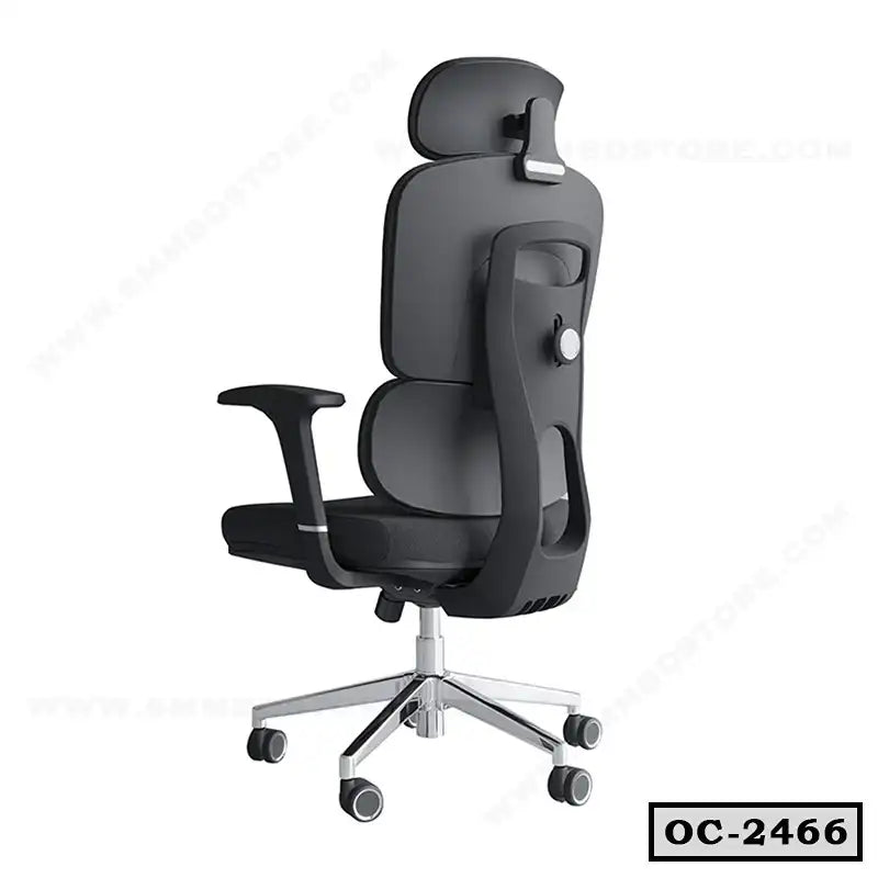 Ergonomic black office chair with adjustable headrest, mesh back, and chrome base on casters