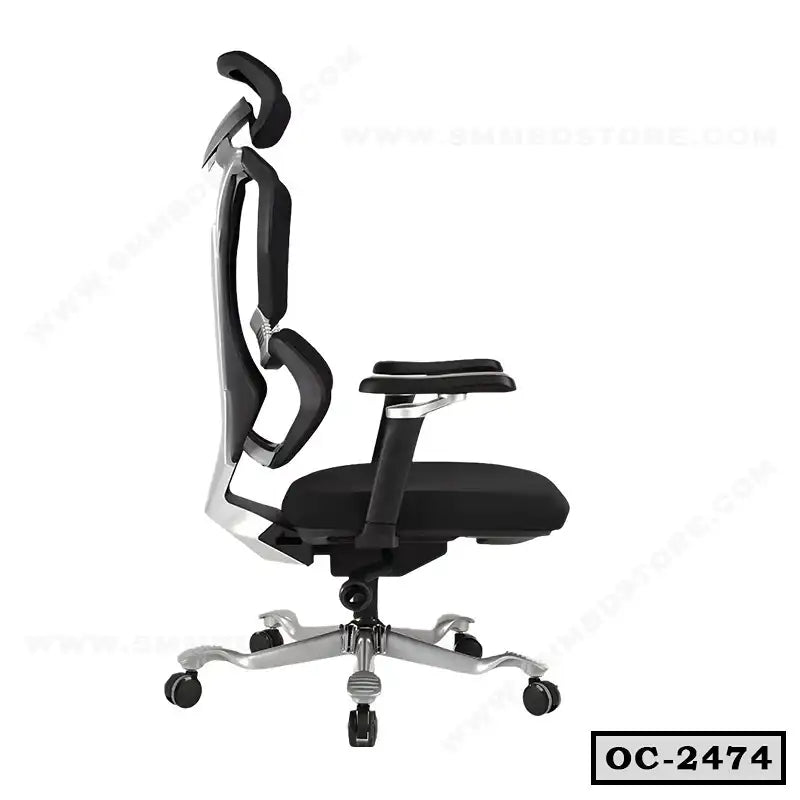 Ergonomic black office chair with adjustable headrest, armrests, and mesh backrest, side view