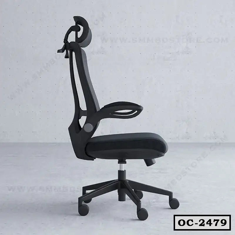 Ergonomic black office chair with headrest, mesh back and wheels on gray floor