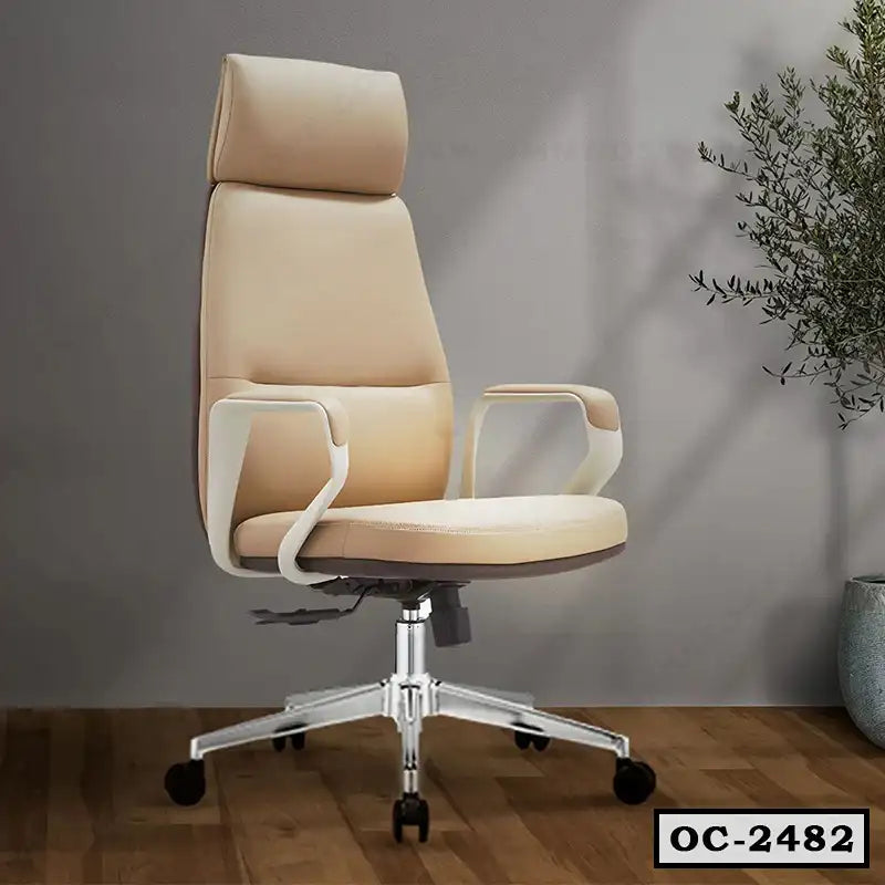 Modern beige ergonomic office chair with headrest and wheels on wooden floor