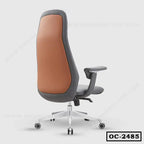 Ergonomic office chair with brown backrest, gray frame, and swivel wheels, side rear view