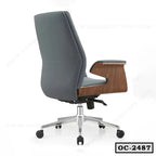 Modern ergonomic office chair with gray upholstery, wooden armrests, and chrome base