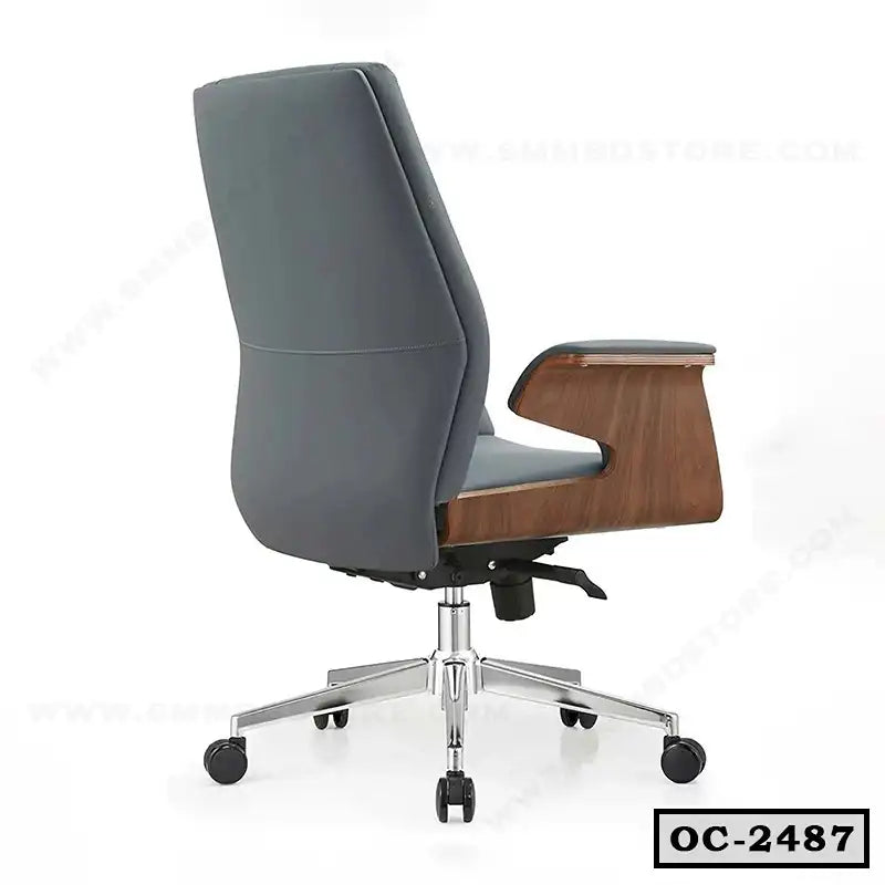 Modern ergonomic office chair with gray upholstery, wooden armrests, and chrome base