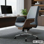 Modern ergonomic office chair with wooden accents and gray upholstery in a contemporary workspace